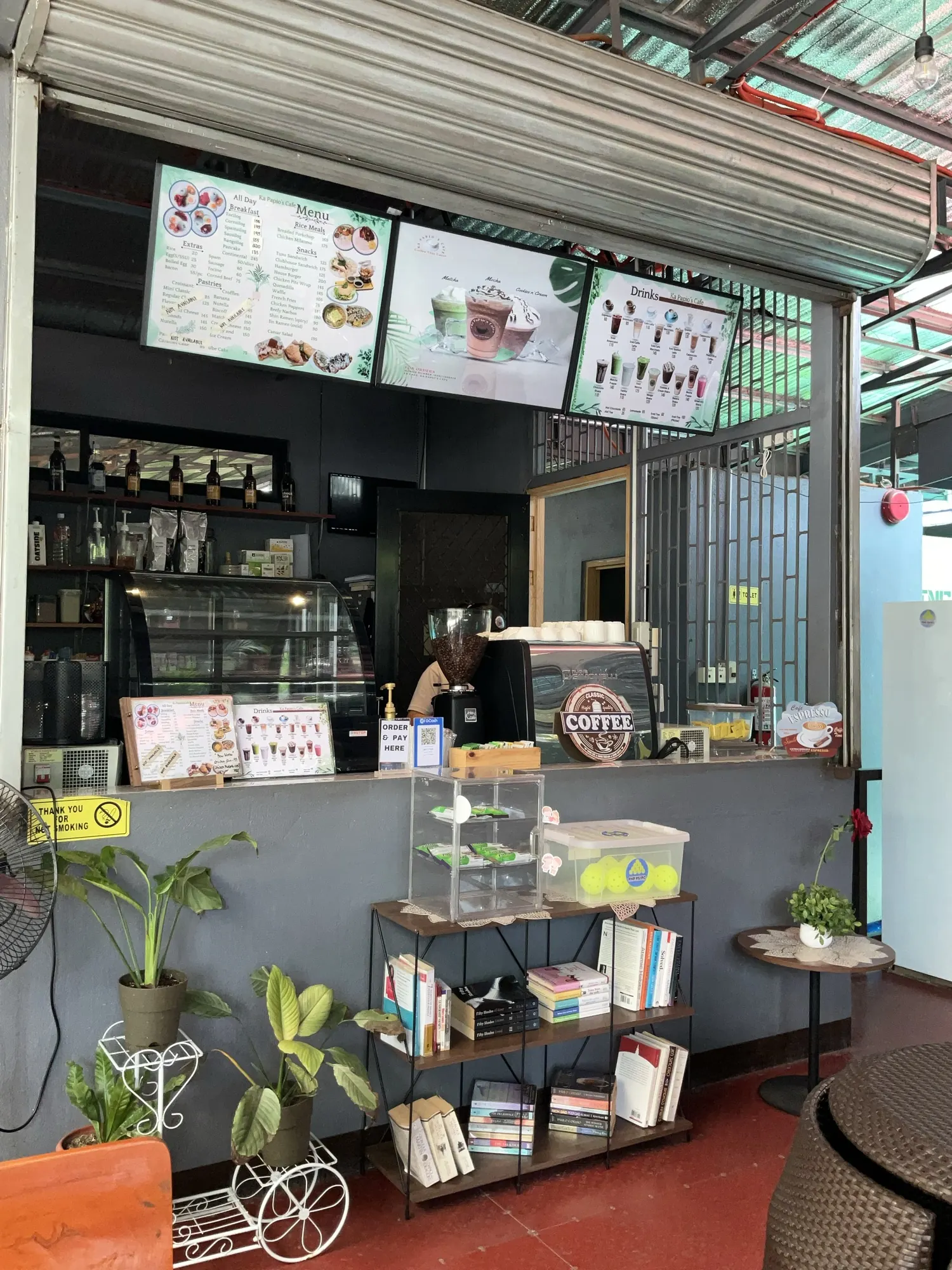 The service counter with the menu boards above it