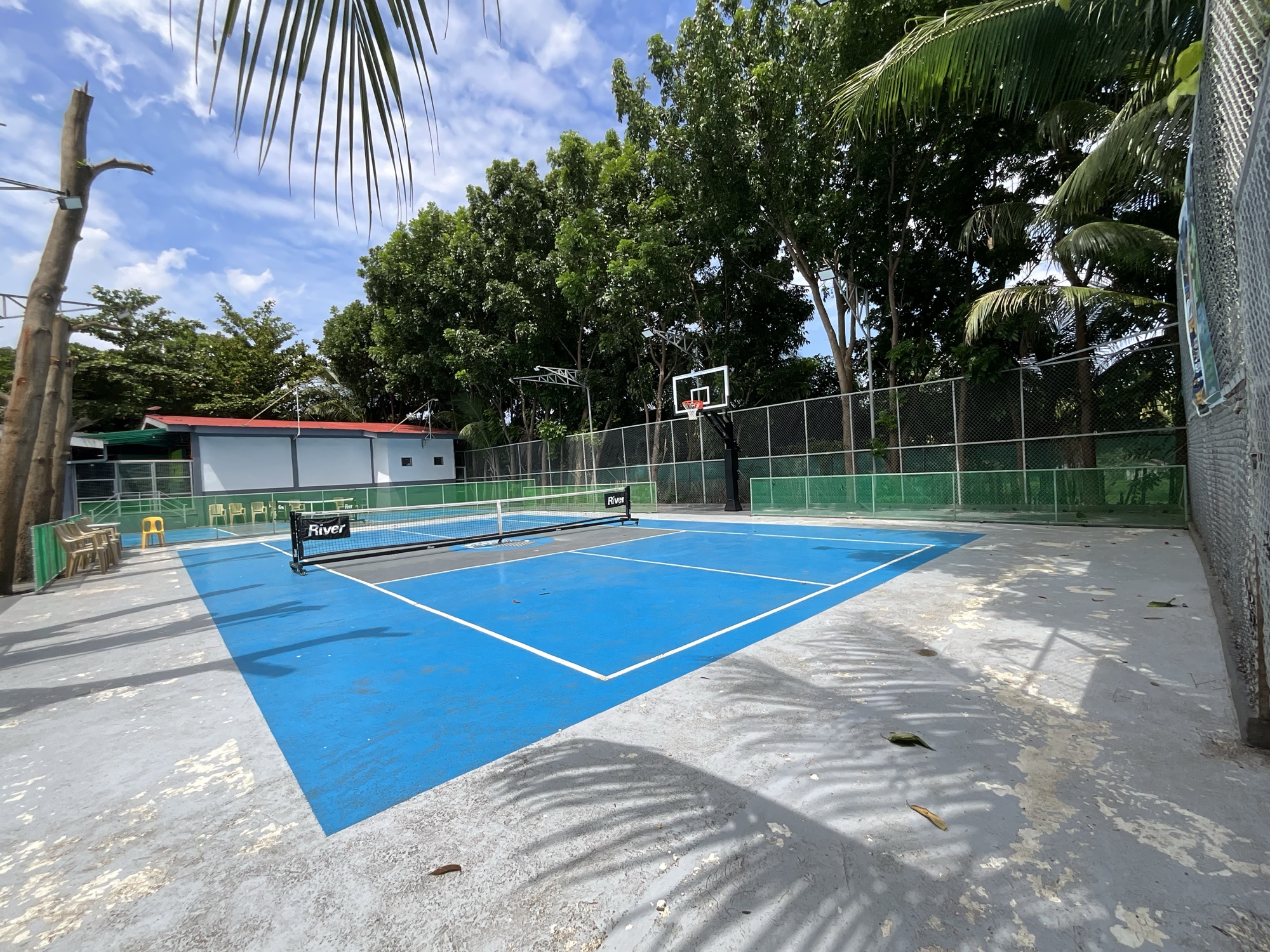 The court surface under a wide sky