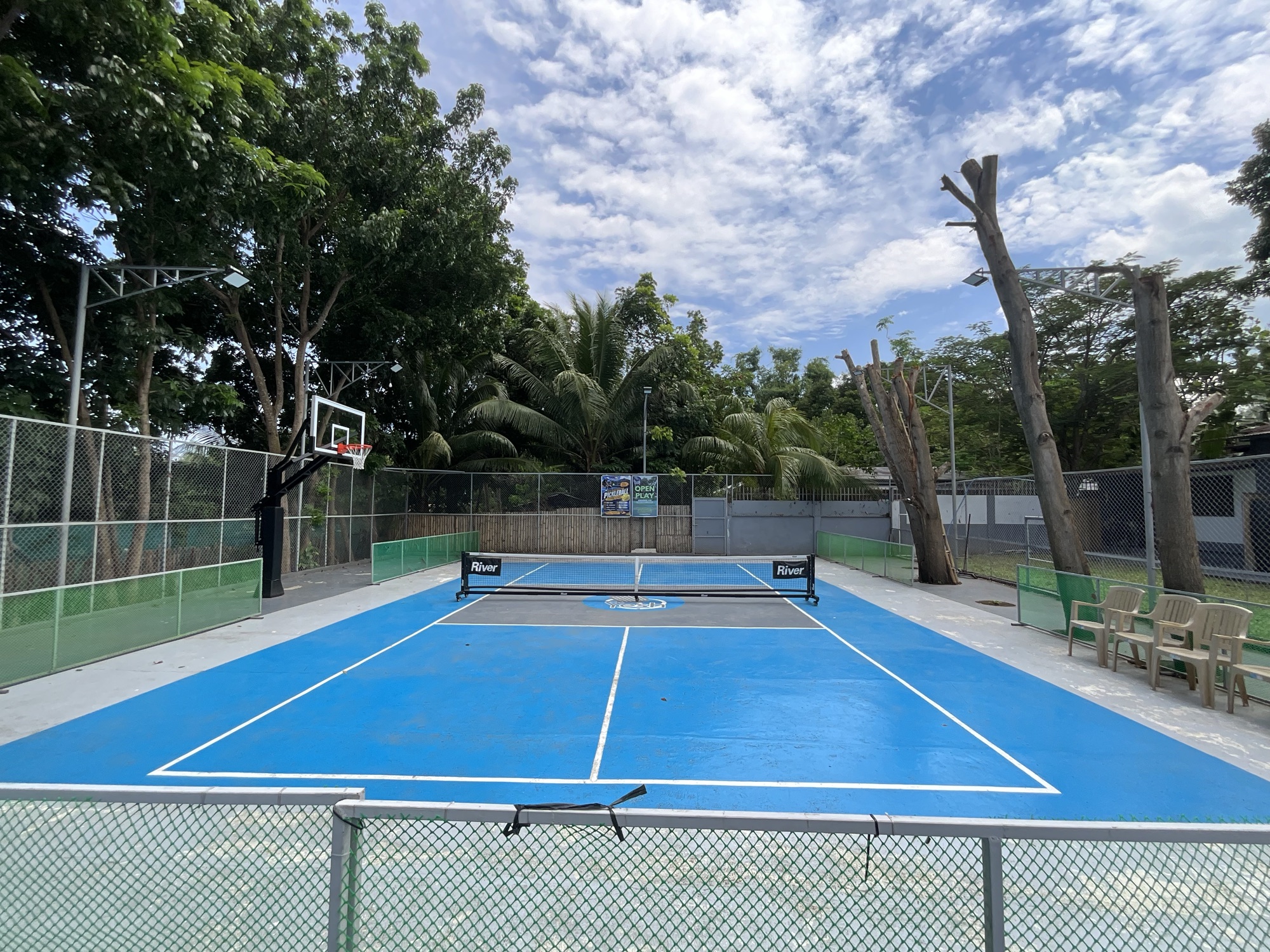 Court and ring with the green perimeter fence